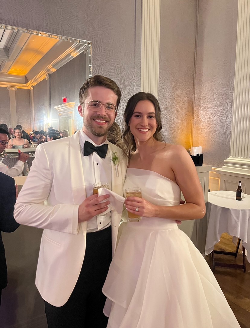 Kyle Maher, MD poses with her husband.